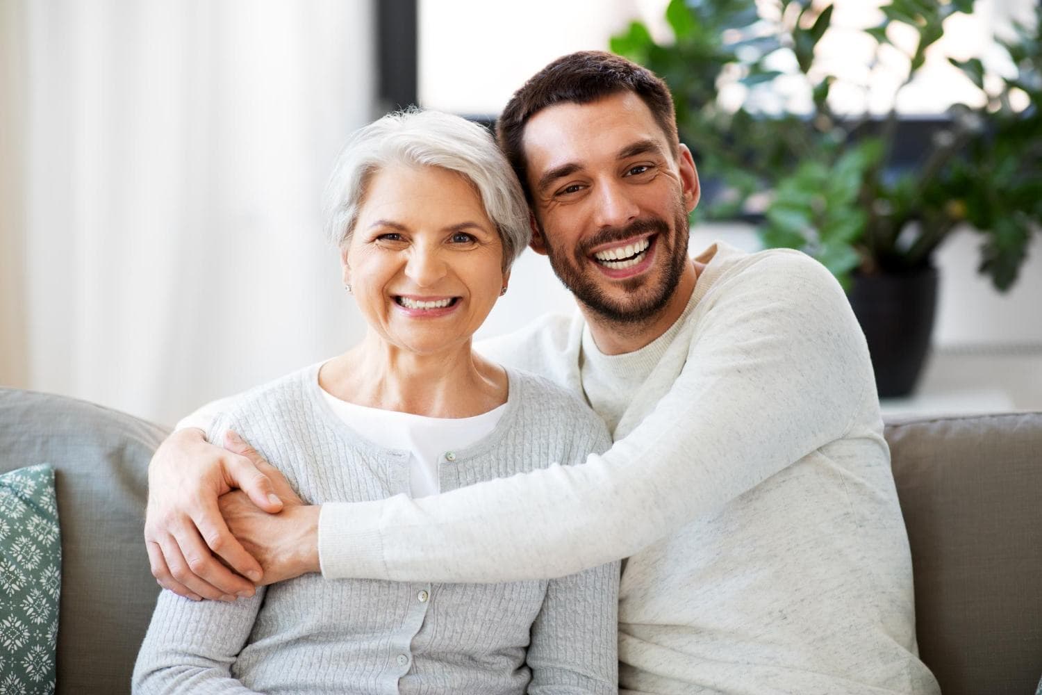 Corey with his mother, both smiling